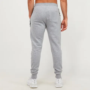 Pantalon de survêtement unisexe 100% coton pantalon de jogging solide personnalisé de haute qualité style sport décontracté avec motif empilé pour hommes - Product Image 1