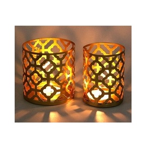 Portavelas votivas de metal premium a precio de venta al por mayor para minoristas que buscan artículos de decoración del hogar elegantes y duraderos en stock - Product Image 1
