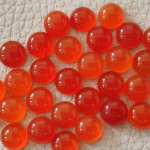 พลอยคาร์เนเลียนสีส้มธรรมชาติทรงกลมเรียบแบบคาโบชอง ขนาดสั่งตัดได้ สำหรับทำเครื่องประดับ แบบหลังแบน - Product Image 1