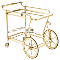 Chariots d'hôtel de luxe faits à la main grande décoration de concepteur antique moderne avec des chariots de service en métal en verre de bordure de couleur dorée