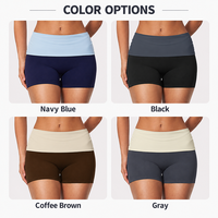 Shorts de yoga et fitness taille haute effet seconde peau, color-block, avec revers, effet push-up fessier et contrôle du ventre, en nylon et élasthanne pour femme