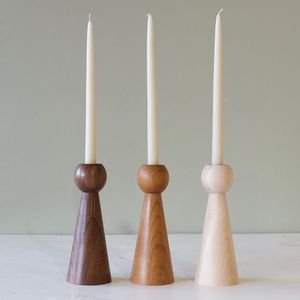 Round wooden candle holder perfect for contemporary interior themes with clean smooth circular design <b>aesthetics</b> - Product Image 1