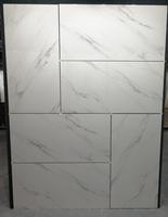 Carreaux de sol en porcelaine de marbre blanc de Carrare de haute qualité 1200x600, modernes, imperméables et résistants au feu pour hall d'hôtel