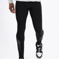 Leggings de compression tricotés respirants sans coutures de haute qualité pour hommes, idéaux pour la course et l'entraînement, avec poche pour vélo