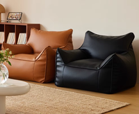 Fauteuil lounge individuel en cuir PU de style nordique, design moderne pour hôtel, villa, salon compact, chambre, balcon