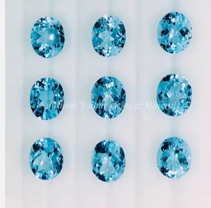 Topaze naturelle coupe ovale prix d'usine en gros haute qualité à facettes en vrac 12x14mm pierre précieuse bleu ciel par carat IGI - Product Image 4