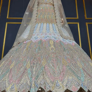 Lehenga choli de mariée avec un travail lourd de jarkan, des touches de design nouveau et un style classique ample - Product Image 1