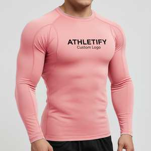 Camiseta de compresión de secado rápido Rashguard para hombre, camiseta atlética con logotipo personalizado, ropa deportiva cómoda para hombres activos - Product Image 1