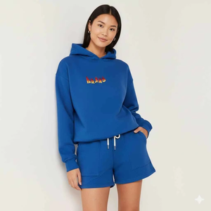 Ensemble de survêtement oversize pour femme : sweat à capuche et short, style décontracté et tendance pour l'été, coupe au-dessus du genou, couleur unie, 100 % coton, écologique - Product Image 1