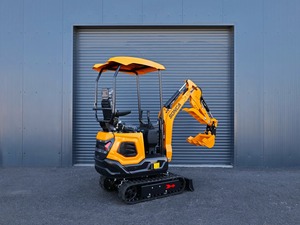 Mini-excavatrice sur chenilles jaune avec bras hydraulique et godet, équipement de construction motorisé - Product Image 1
