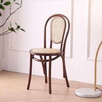 Chaise de salle à manger pivotante Sonett en bois massif avec dossier en rotin, style nordique, usage commercial, intérieur