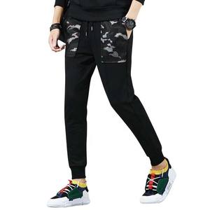 กางเกงวิ่งขายาวสำหรับผู้ชายกางเกงเอวยางยืดพิมพ์ลายสกรีนโลโก้แบบกำหนดเอง - Product Image 1