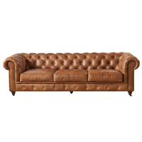 Canapé Chesterfield classique trois places extensible convertible en cuir véritable avec structure en bois, capitonné compressé, modulaire et pivotant