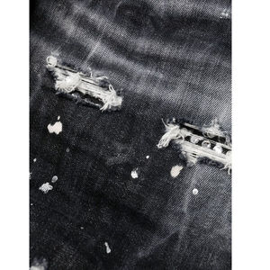 Jeans slim pour homme en denim de coton noir déchiré, coupe droite, fermeture à braguette et à boutons, 5 poches et peintures OEM - Product Image 6