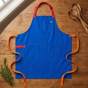 Delantal de Lona Azul Reutilizable con Correa Roja para el Cuello, Lazos Naranjas en la Cintura y Tres Bolsillos para Cocinar y Uso Diario - Product Image 1