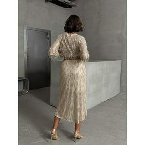 Vente en gros de jupes en plumes et paillettes pour femmes - Product Image 1