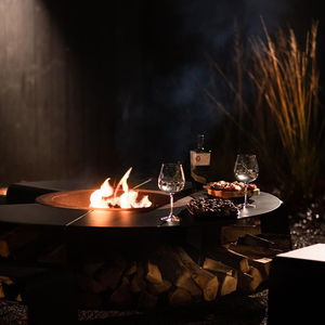 Table de foyer extérieure ronde multifonctionnelle en acier Corten avec combustible en bois, table de feu éco-responsable pour la décoration de patio - Product Image 5