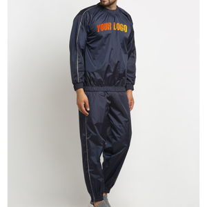 Vente en gros de vêtements de fitness survêtement en nylon coupe-vent de couleur unie pour hommes avec poches survêtements légers en nylon 100% pour hommes - Product Image 1