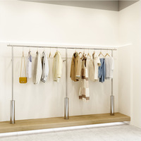 2024 acier inoxydable magasin de vêtements présentoir mur sol cintres présentoir