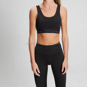 Gym Fitness Yoga Wear Sujetador de etiqueta privada y pantalones de mujer con logotipo y diseño personalizados hechos de material de nylon Spandex - Product Image 1