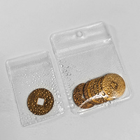 En stock : Pochette refermable en PVC transparente anti-oxydation avec trou de suspension et fermeture éclair pour l'emballage de pièces de monnaie, badges, pendentifs, breloques et bijoux
