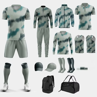 Nouvel Arrivage Ensemble d'uniformes de football professionnels unisexe, imprimé par sublimation, 100% Polyester, Anti-bactérien, Logo personnalisé, Poches avant complètes