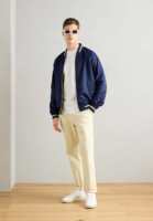 Veste varsity en toile à capuche longue pour homme avec fermeture à bouton unique et poches