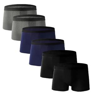 Calzoncillos de algodón con logotipo personalizado de fábrica para hombre, bóxer de alta calidad, ropa interior cómoda de punto liso para hombre - Product Image 1