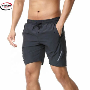 Pantalones cortos de gimnasio con logotipo personalizado, ropa deportiva doble de poliéster de secado rápido para entrenamiento en gimnasio, pantalones cortos de entrenamiento de Fitness de Color sólido con bolsillos teñidos lisos - Product Image 2