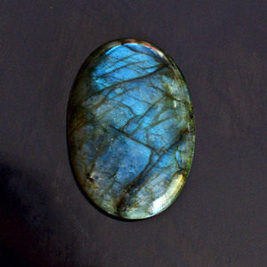 พลอยลาบราดอไรต์สีน้ำเงิน ขนาด 50x15x8 มม. ทรงรีแบนเรียบขัดเงา คุณภาพเยี่ยม พร้อมแสงสะท้อนสีฟ้า - Product Image 4
