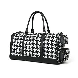 최신 트렌드에 따라 디자인되고 조절 가능한 어깨 끈이 있는 흑백 패턴 캔버스 여행 가방