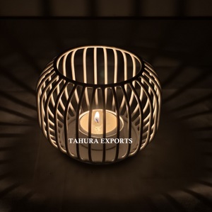 Tabletop Cage Style Candle Holder with Lightweight Frame and Vintage Charm for Floating Ambient Glow in Rustic Cozy Interiors - Product Image 1