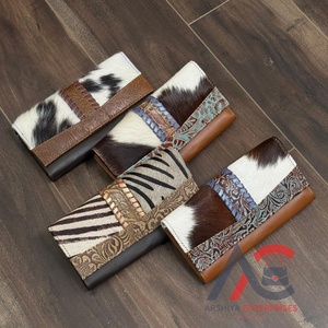 กระเป๋าสตางค์สตรีหนังวัวแท้สลักลายแฟชั่นจากนักออกแบบ2025ความจุมากเคสโทรศัพท์คลัทช์อเนกประสงค์สำหรับผู้หญิง - Product Image 1