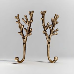 Artistic brass wall hooks for expressive interiors merging sculpture utility home decor appeal storage comfort daily use - Product Image 1