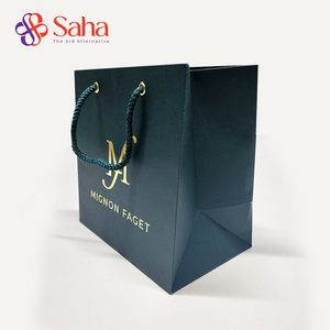 Bolsas de compras de papel Kraft marrón OEM Materiales reciclados hechos a mano Laminación mate Barnizado Ropa de precio económico - Product Image 1