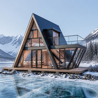 Cabane préfabriquée moderne en forme de A avec murs isolés et équipements de vie complets