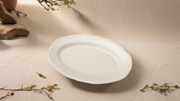 Assiette de service à dessert de restaurant de style occidental classique de novembre nouvellement lancée Design ovale blanc écologique pour les fêtes