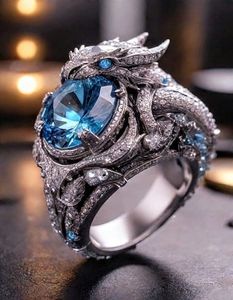 Anillo de Lujo Unisex de Moda con Diamante Moissanita Ovalado Azul Dragón Personalizado, Relleno de Plata 925, Certificado IGI, Corte Brillante - Product Image 1