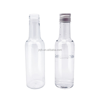 Bouteille de vin ronde vide en plastique Bouteille d'eau de jus de vin en plastique à long cou pour boire avec couvercle en aluminium