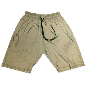 Pantalones cortos cortavientos de nailon deportivos de verano para hombre con bolsillo con cremallera lateral logotipo personalizado decoración de agujeros frescos tela peinada - Product Image 1