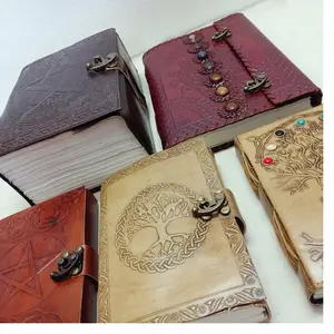 custom made leather journals with celtic ,occult and witchcraft available with 7 chakra stones, celtic star embossing and tree