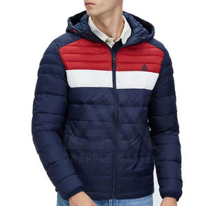 Chaqueta acolchada ligera OEM hecha en Pakistán personalizable con su logotipo con capucha y decoración de patrón para el invierno - Product Image 1