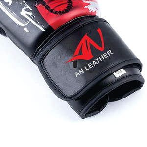 นวมชกมวยไทยคุณภาพสูง ปักโลโก้ได้ตามต้องการ สำหรับฝึกซ้อมและแข่งขัน ระบายอากาศได้ดี บุผ้าฝ้าย ผลิตจากหนังวัวแท้ - Product Image 2