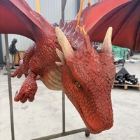 Grande statue de dragon rouge en terre cuite grandeur nature avec écailles détaillées et structure métallique pour décorations de festivals, centres commerciaux et aéroports