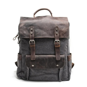 กระเป๋าเป้สะพายหลังของผู้ชายหนัง PU สีน้ำตาลออกแบบได้ตามต้องการสำหรับ2024ดีไซน์แฟชั่นพร้อมช่องชาร์จไฟกันลักษณะใหม่ราคาถูก - Product Image 1