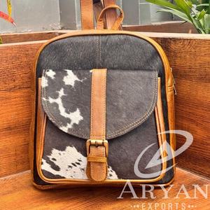 กระเป๋าเป้สะพายหลังขนาดเล็กหนังวัวแท้คุณภาพสูงใหม่กระเป๋าสะพายหลังแบบตะวันตกทำจากหนังแท้สำหรับทุกเพศ - Product Image 1