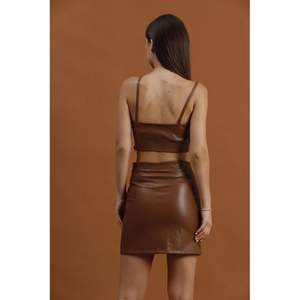 Ventes en gros de mini-jupes en similicuir pour femmes - Product Image 1