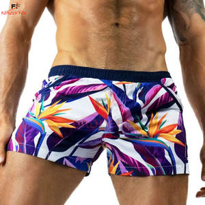 Precio bajo Verano Logotipo personalizado Imprimir Hombres Verano Color sólido Playa Deportes Pantalones cortos Hombres Pantalones cortos de baño Hombres - Product Image 5
