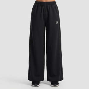 Pantalon large noir respirant pour femme avec taille élastique, motif anime décontracté, en tissu éponge uni, teint et froissé, couleur délavée - Product Image 1