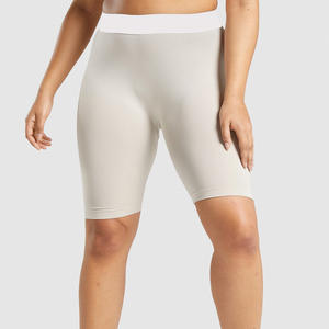 Pantalones cortos de motorista para mujer personalizados OEM, ropa de gimnasia y entrenamiento de cintura alta con tela transpirable y marca de marca privada - Product Image 1